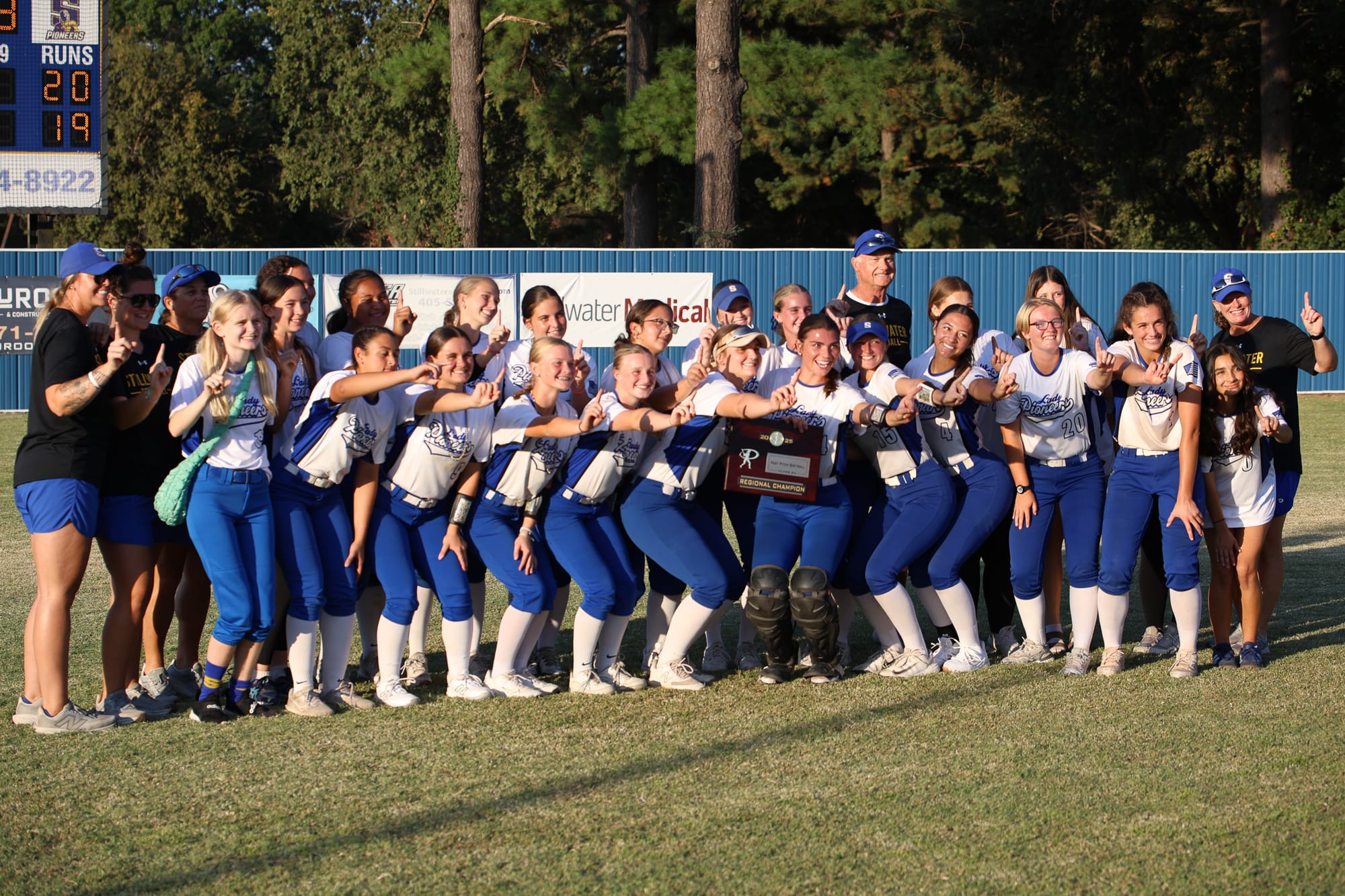 Lady Pioneers Survive Epic Slugfest, Win Regional Title in Extra Innings