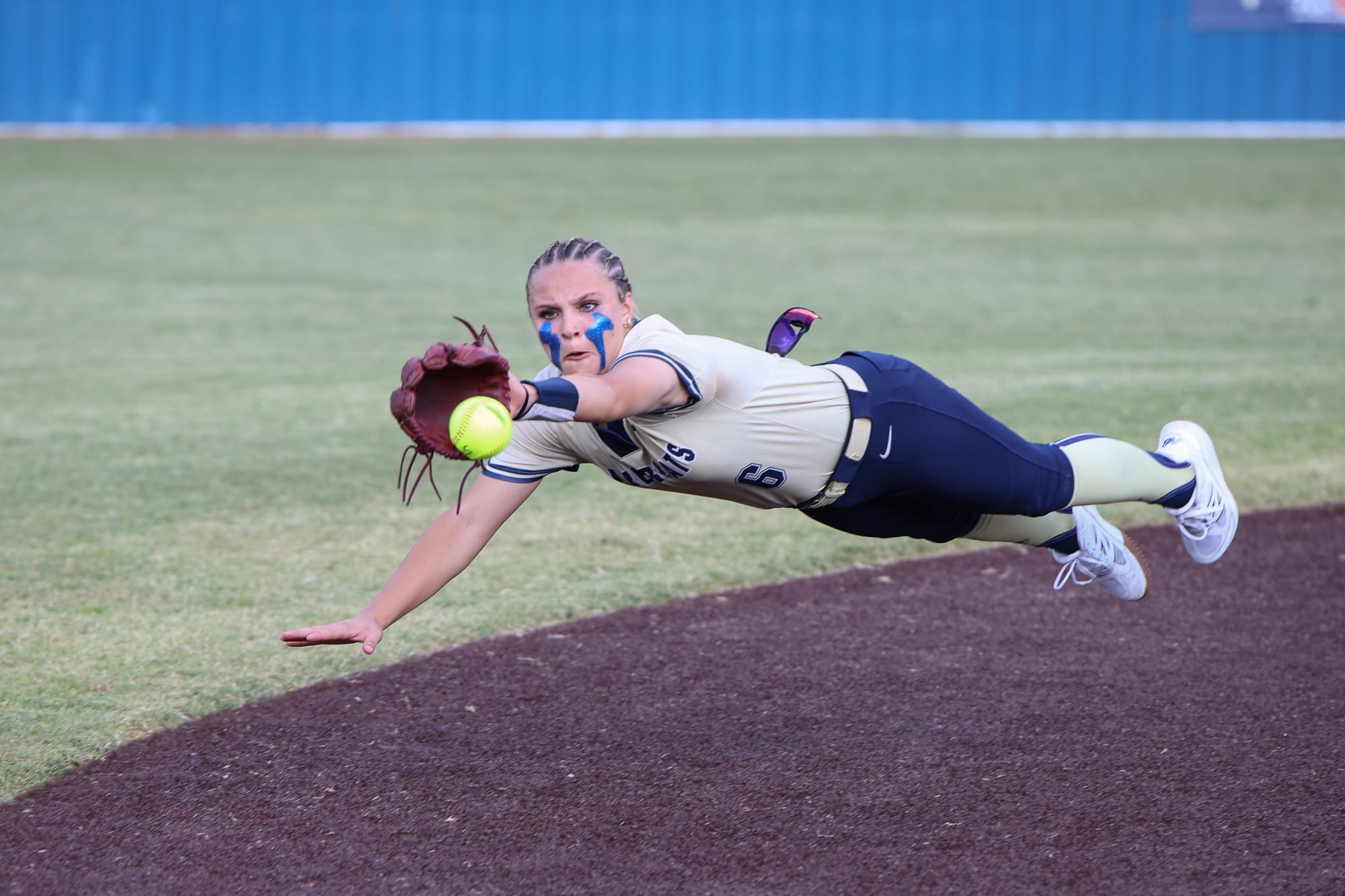 Lady Pioneers Survive Epic Slugfest, Win Regional Title in Extra Innings