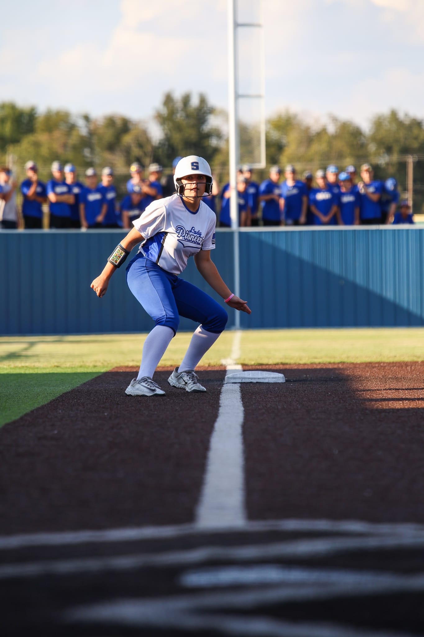 Lady Pioneers Survive Epic Slugfest, Win Regional Title in Extra Innings