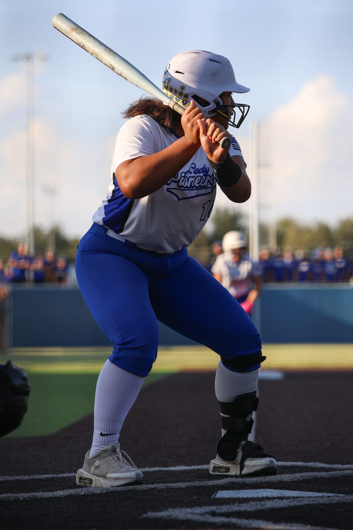 Lady Pioneers Survive Epic Slugfest, Win Regional Title in Extra Innings