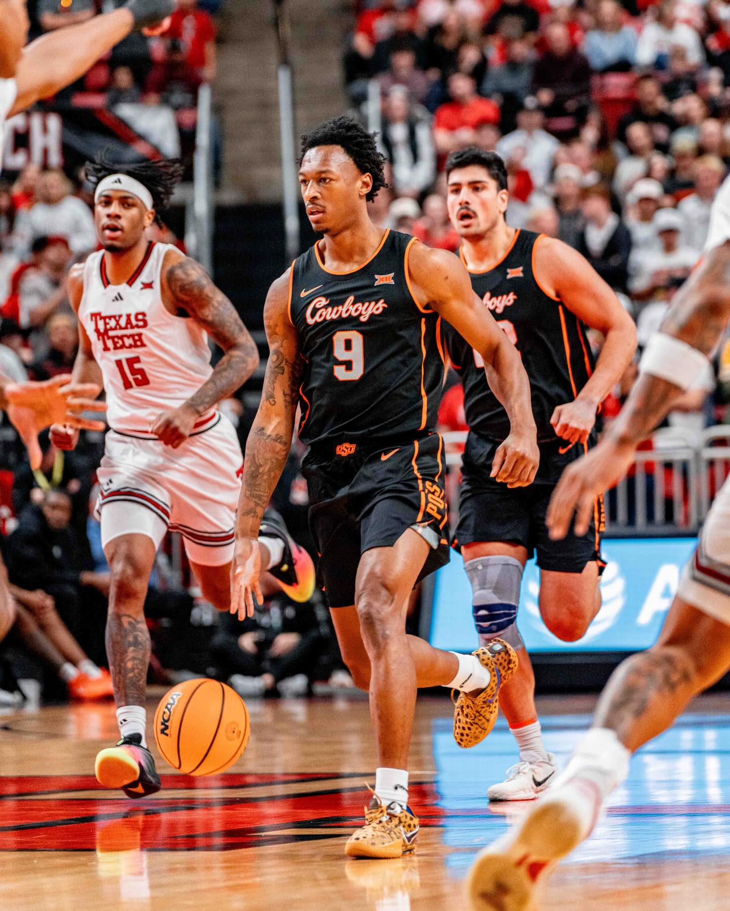 Oklahoma State guard Anthony Roy (9) in black uniform with basketball during Cowboys' game against Texas Tech in Lubbock, Texas on Jan. 3, 2026. Roy led OSU with 22 points.