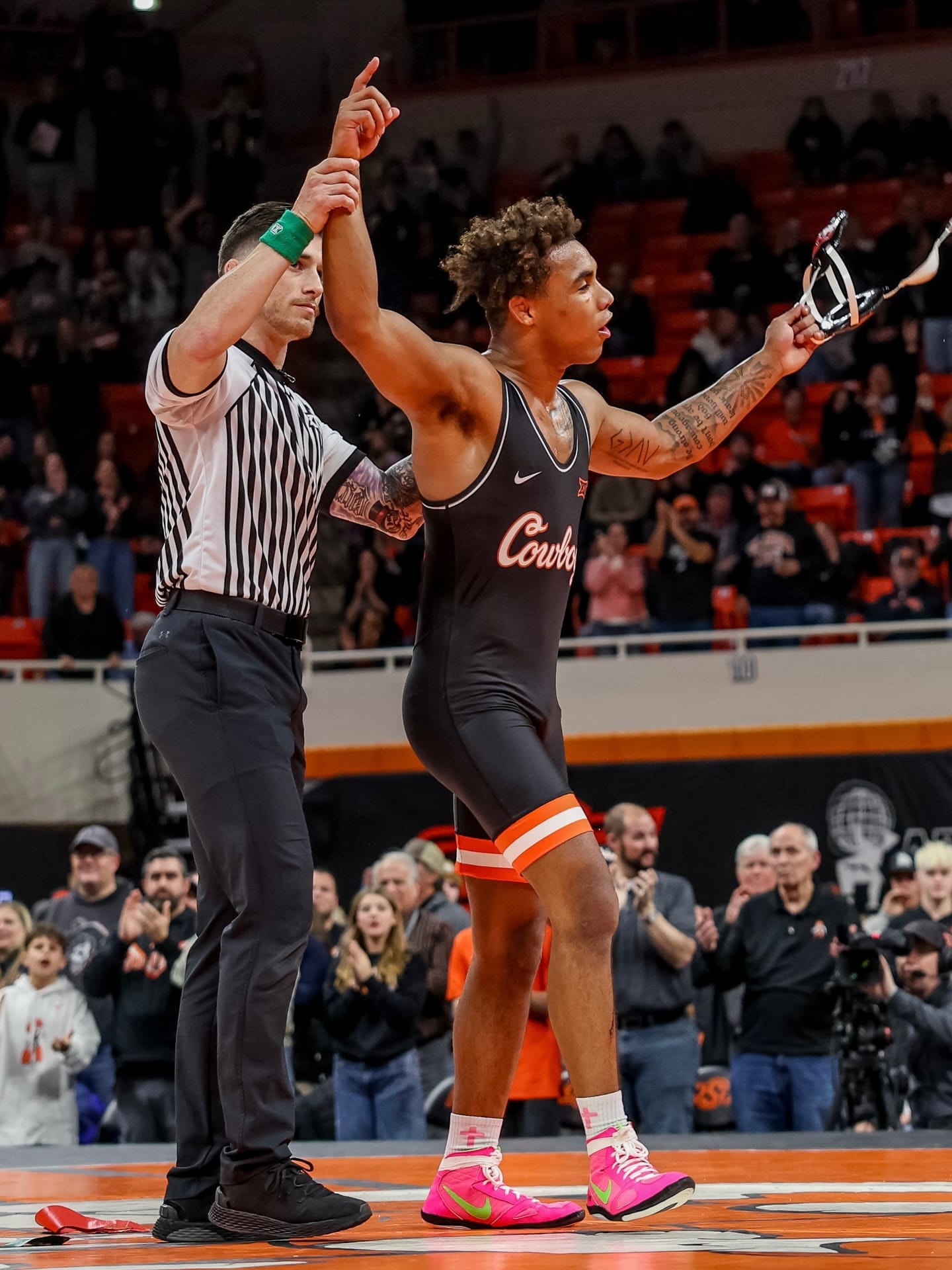 Oklahoma State freshman wrestler Dee Lockett has his hand raised by referee after securing 6-4 decision victory over Northern Iowa opponent at Gallagher-Iba Arena Jan. 30, 2026