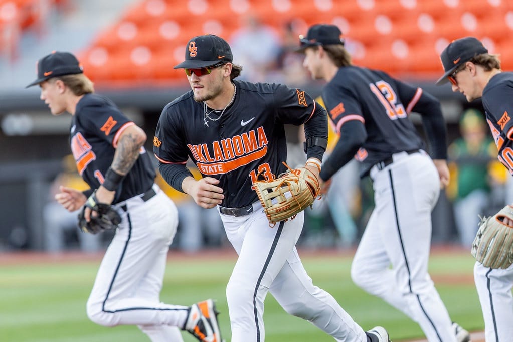 OSU center fielder Kollin Ritchie (13) runs on the field during the Cowboys' game against North Dakota State at O'Brate Stadium. Ritchie batted .538 in last year's regional.