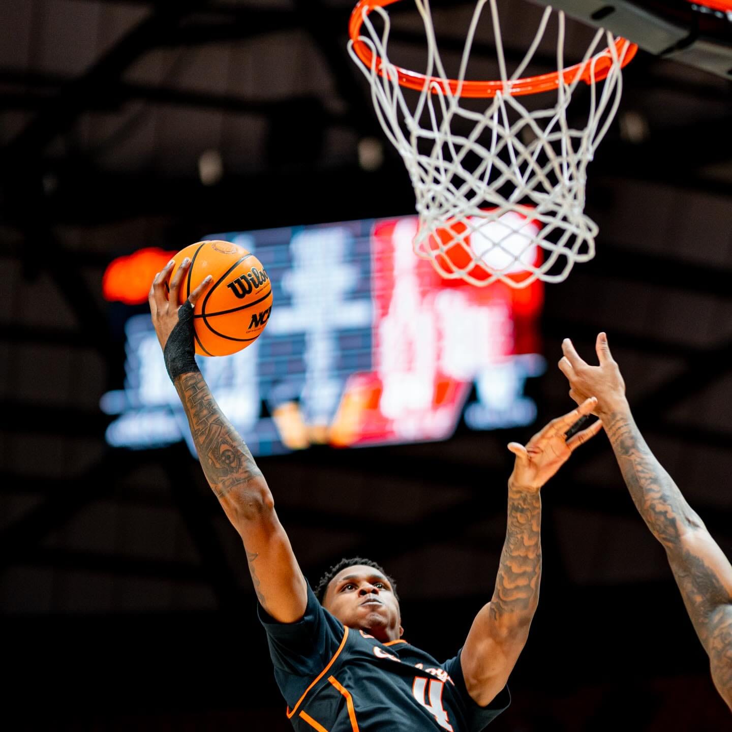 Oklahoma State forward Christian Coleman drives to basket during Cowboys' 81-69 road win over Utah Saturday at Jon M. Huntsman Center in Salt Lake City.