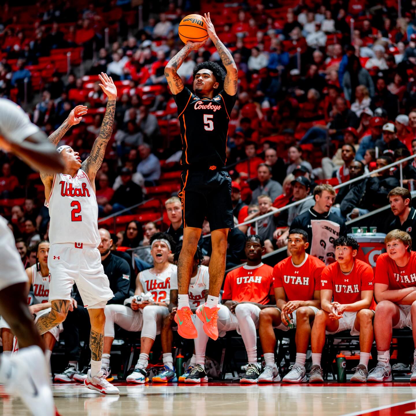 Oklahoma State guard Vyctorius Miller shoots a jump shot over a Utah defender during the Cowboys' 81-69 road victory at the Jon M. Huntsman Center in Salt Lake City on January 31, 2026.