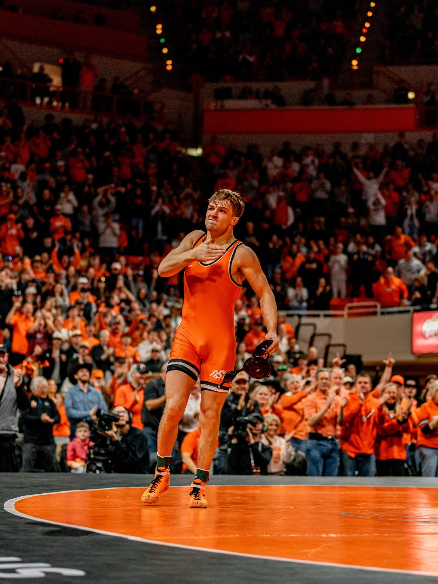 Oklahoma State's Casey Swiderski celebrates after defeating Iowa State's Jacob Frost 4-2 at 149 pounds during OSU's 24-9 win over the Cyclones Sunday at Gallagher-Iba Arena.