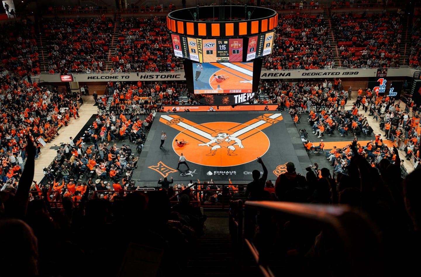 Gallagher-Iba Arena is packed as Oklahoma State's Alex Facundo wrestles Iowa State's MJ Gaitan at 174 pounds during OSU's 24-9 win over the Cyclones Sunday in Stillwater.