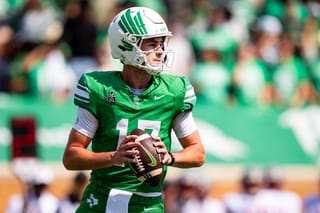 North Texas quarterback Drew Mestemaker in green jersey number 17 preparing to throw during game against Washington State on Sept. 13, 2025