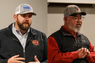 Dillon Travis, left, in black jacket and white campaign cap, and Mike Waters, right, in red shirt and gray cap, speak to voters at an OK2A meeting in Cleveland, Oklahoma.