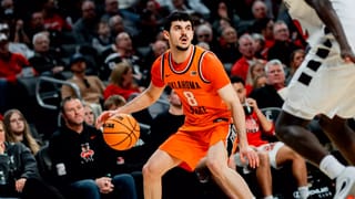OSU freshman guard Daniel Guetta (8) dribbles against Cincinnati on Feb. 28, 2026. Guetta scored 11 points in OSU's NIT win over Davidson.