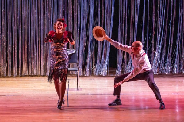 Kristi Riley and Chris Peters perform their Chicago-themed dance routine on stage at Dancing with Saville, which raised a record $40,205 for The Saville Center.