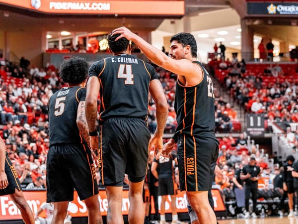 Oklahoma State basketball players Parsa Fallah (22), Vyctorius Miller (5) and Christian Coleman (4) in black uniforms during Cowboys' game at Texas Tech in Lubbock, Texas on Jan. 3, 2026.