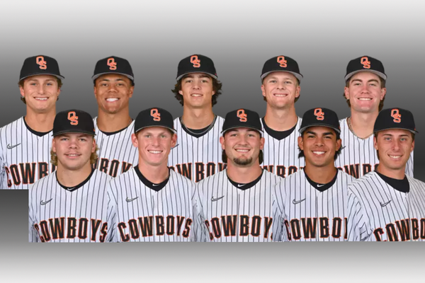 Ten Oklahoma State baseball players in Cowboys uniforms pose for team photo in two rows, all wearing black caps with orange OS logo and pinstriped white jerseys.