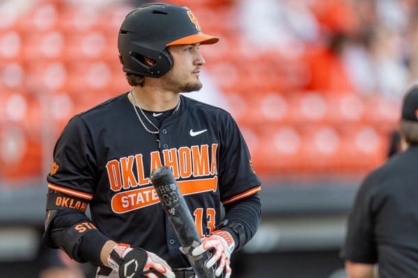 Oklahoma State outfielder Kollin Ritchie (13) in black Cowboys uniform looks on during game against North Dakota State at O'Brate Stadium, March 18, 2025.
