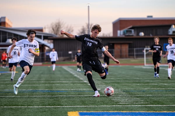 Stillwater senior Graham Condley (10) strikes toward goal during the Pioneers' 3-0 shutout of OKC Storm on March 24, 2026, at Pioneer Stadium.