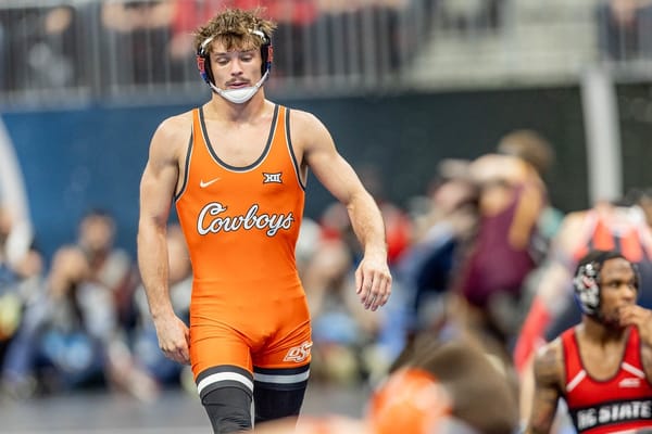 Oklahoma State 125-pound wrestler Troy Spratley walks off the mat after a second-round win at the 2026 NCAA Wrestling Championships in Cleveland.