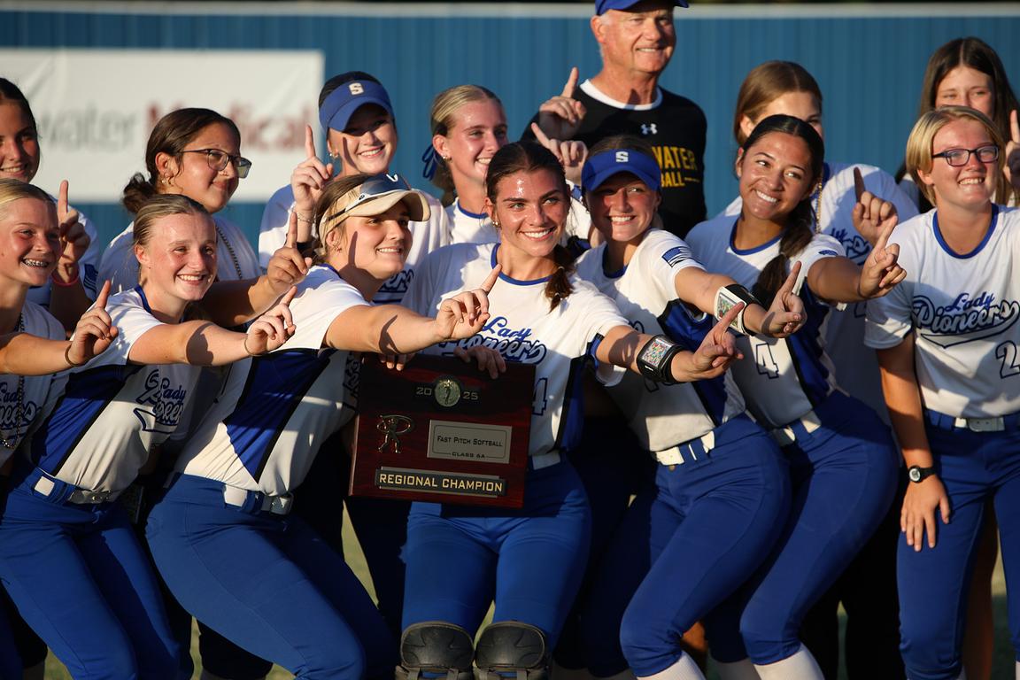 Lady Pioneers Survive Epic Slugfest, Win Regional Title in Extra Innings